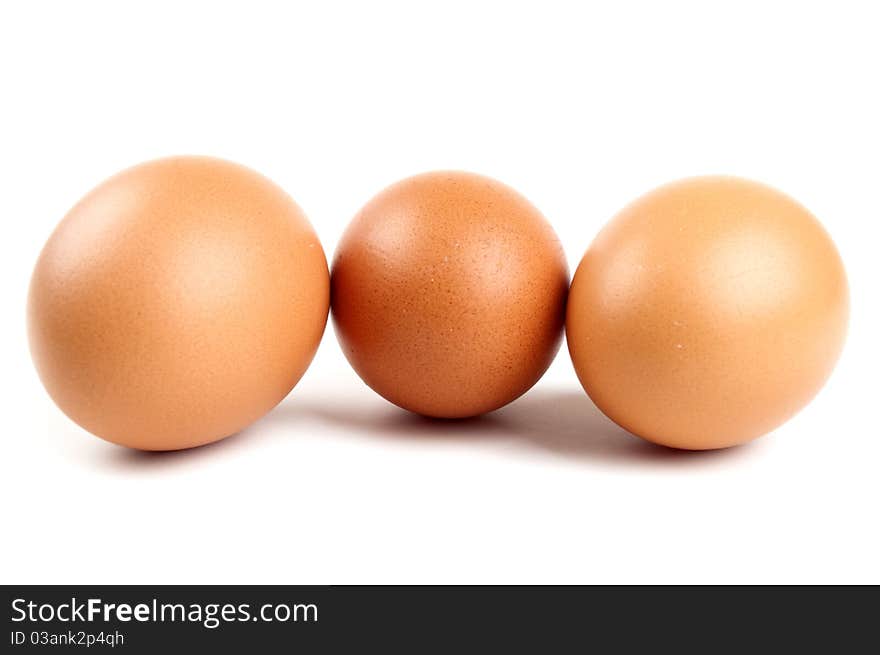 Three eggs in a carton