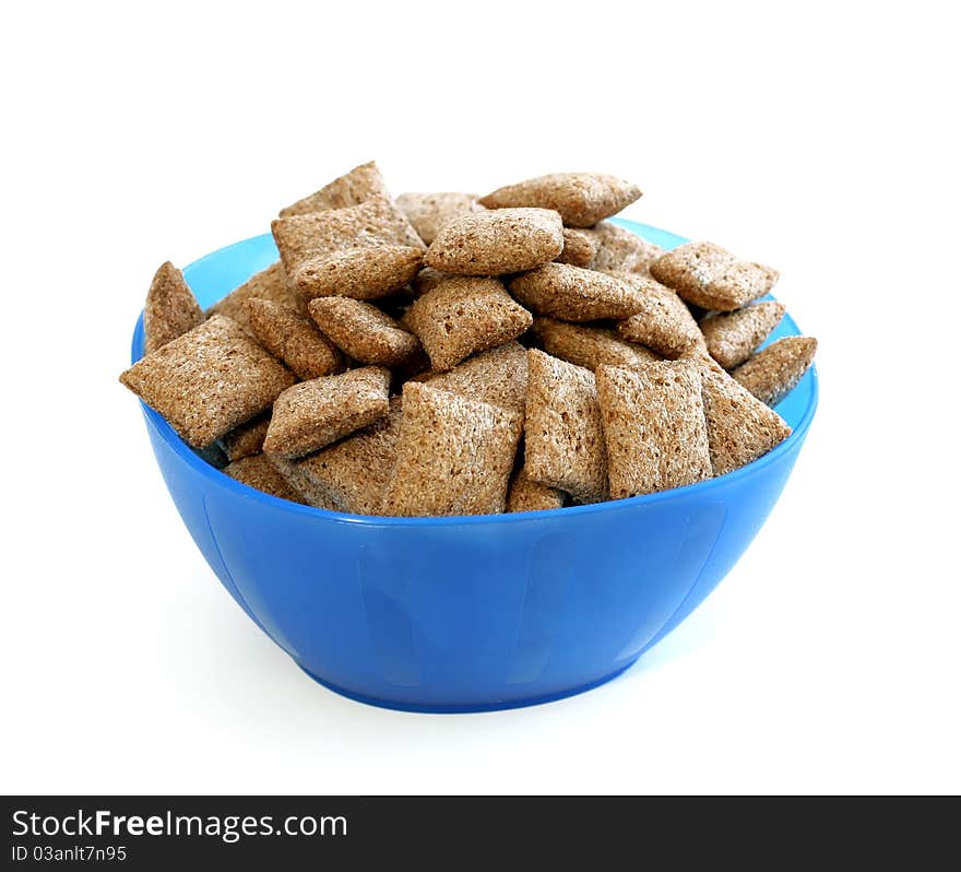 Chocolate Muesli In Blue Bowl Isolated On White