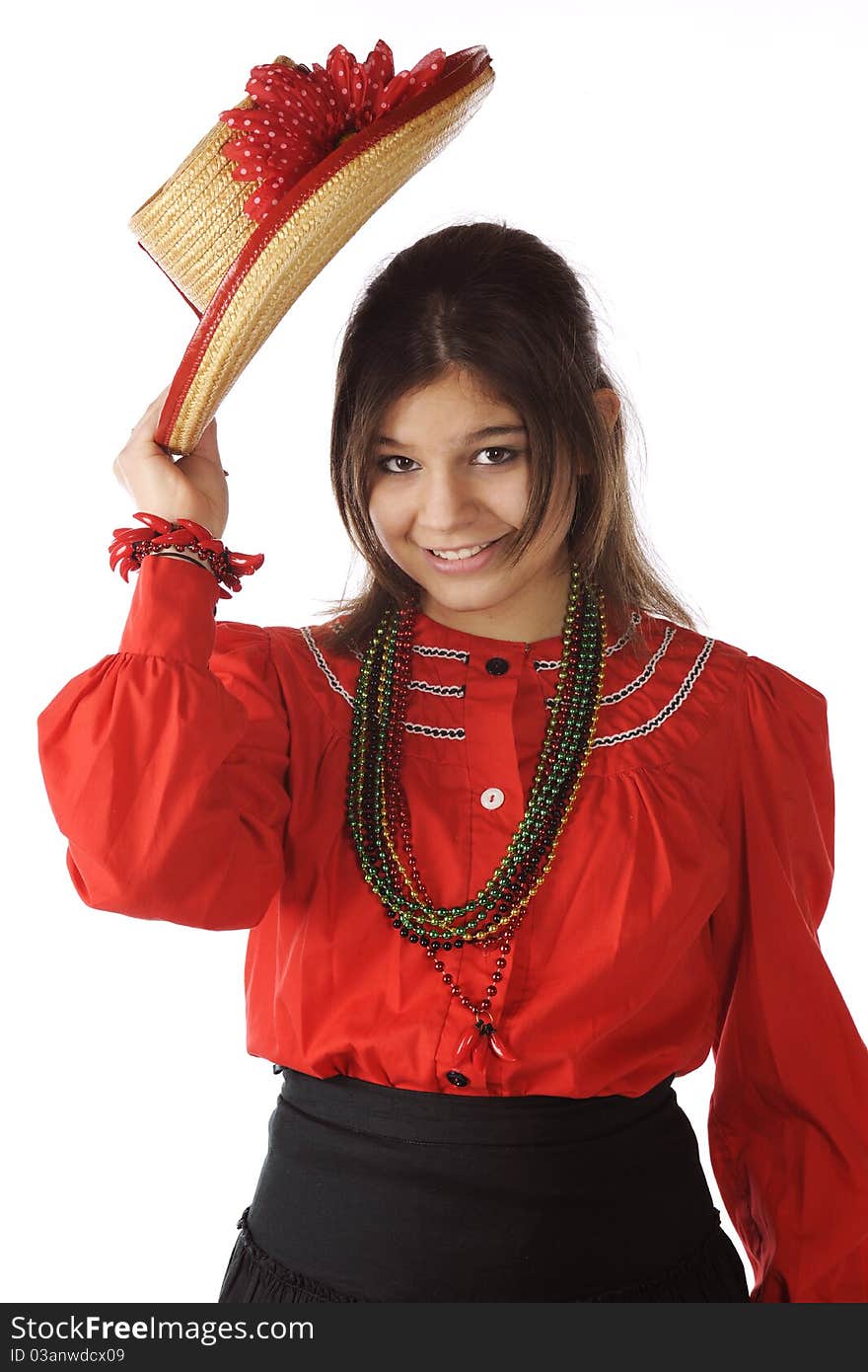 A happy young teen in red and black Mexican attire tipping her hat in greeting. Isolated on white. A happy young teen in red and black Mexican attire tipping her hat in greeting. Isolated on white.