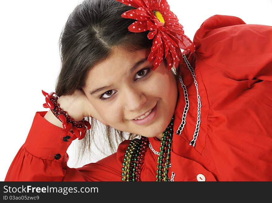 Closeup of a beautiful young teen in red Mexican attire. Closeup of a beautiful young teen in red Mexican attire.