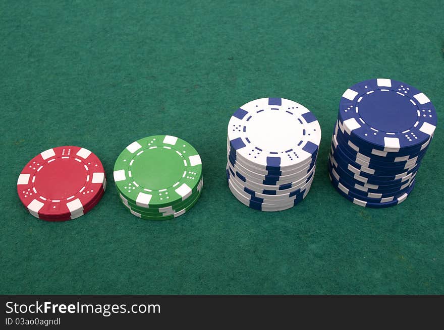 Many poker chips on a white background