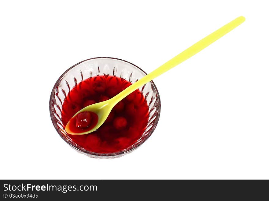 Sweet cherry compote isolated on white background