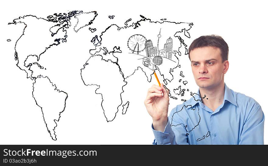 Businessman drawing a city of the future and the map of world on white background