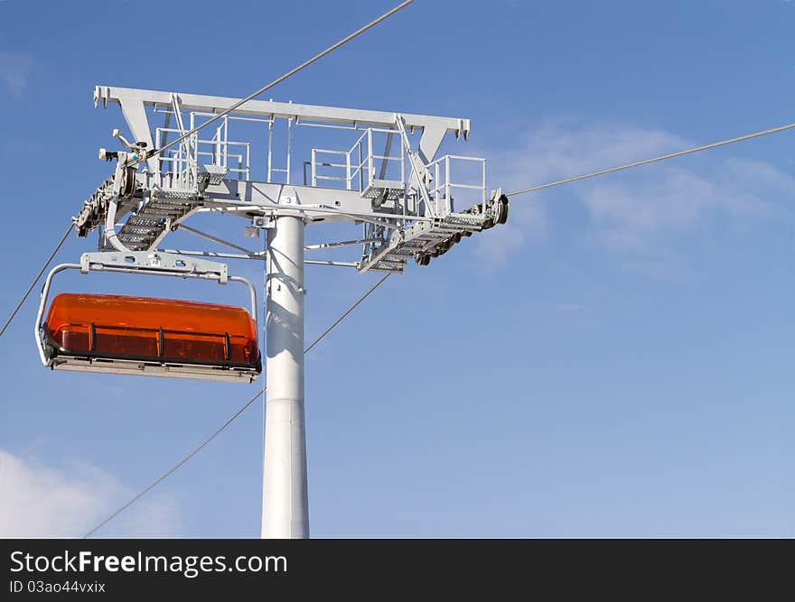 Chairlift and mountain with nice blue sky