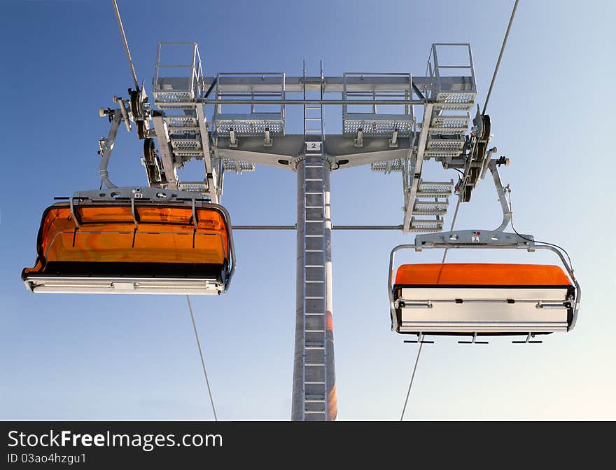 Chairlift and mountain with nice blue sky