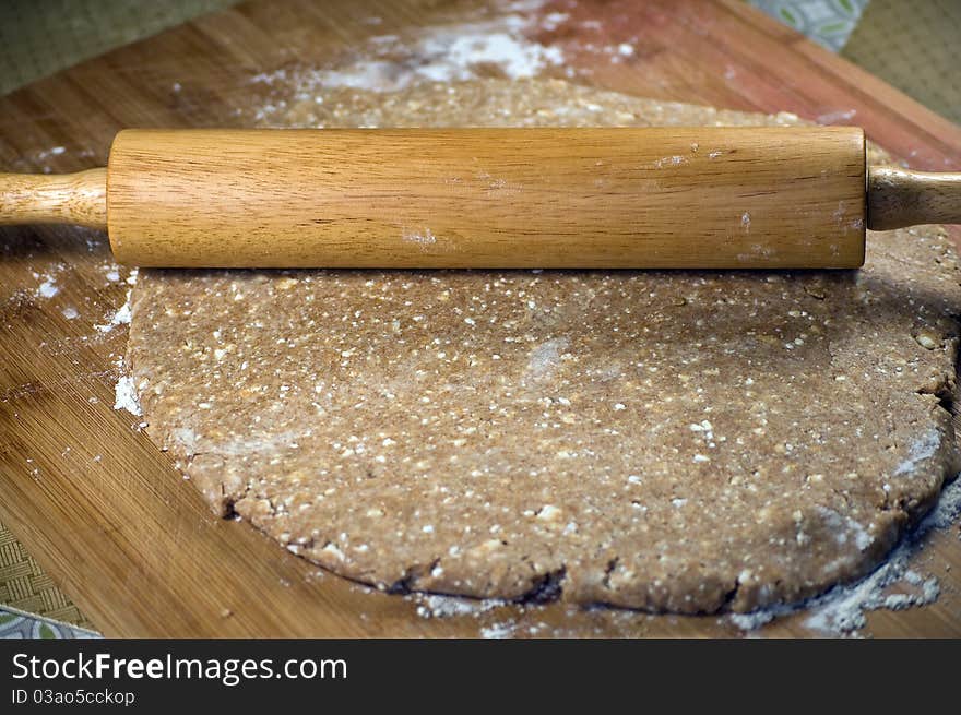 Rolling Pin over Whole Wheat Dough with Cottage Cheese