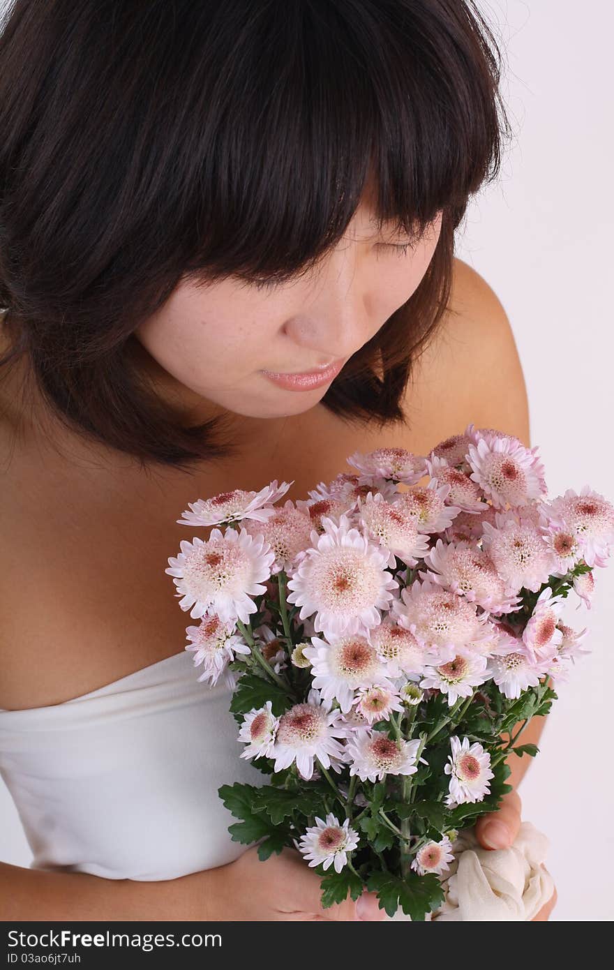 Attractive young Asian woman close-up