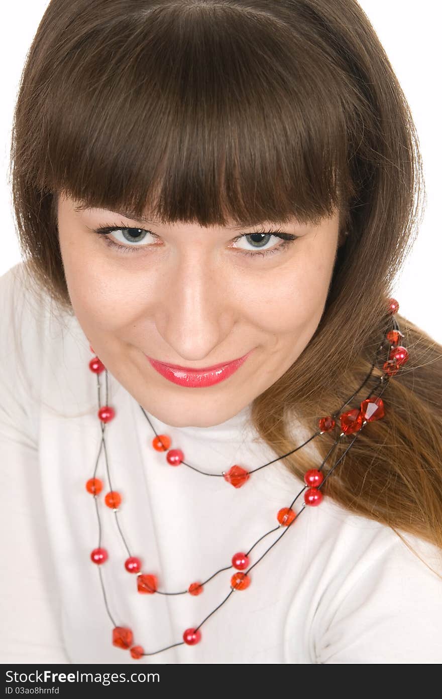 Portrait of young woman in white blouse