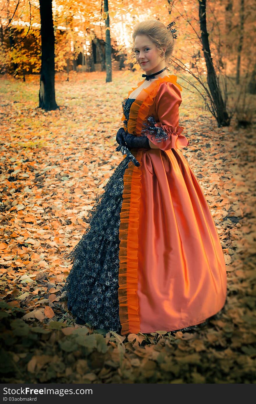 Baroque girl in autumn park. Baroque girl in autumn park