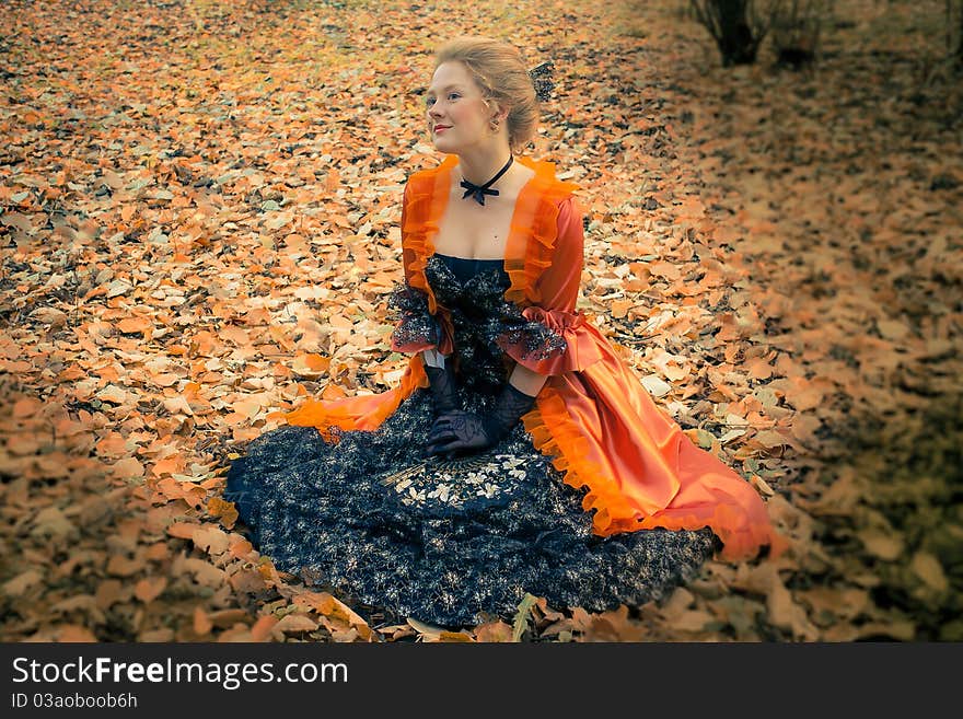 Baroque girl in autumn park. Baroque girl in autumn park