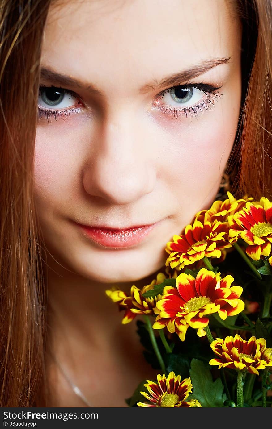 Woman with flower in studio. Woman with flower in studio