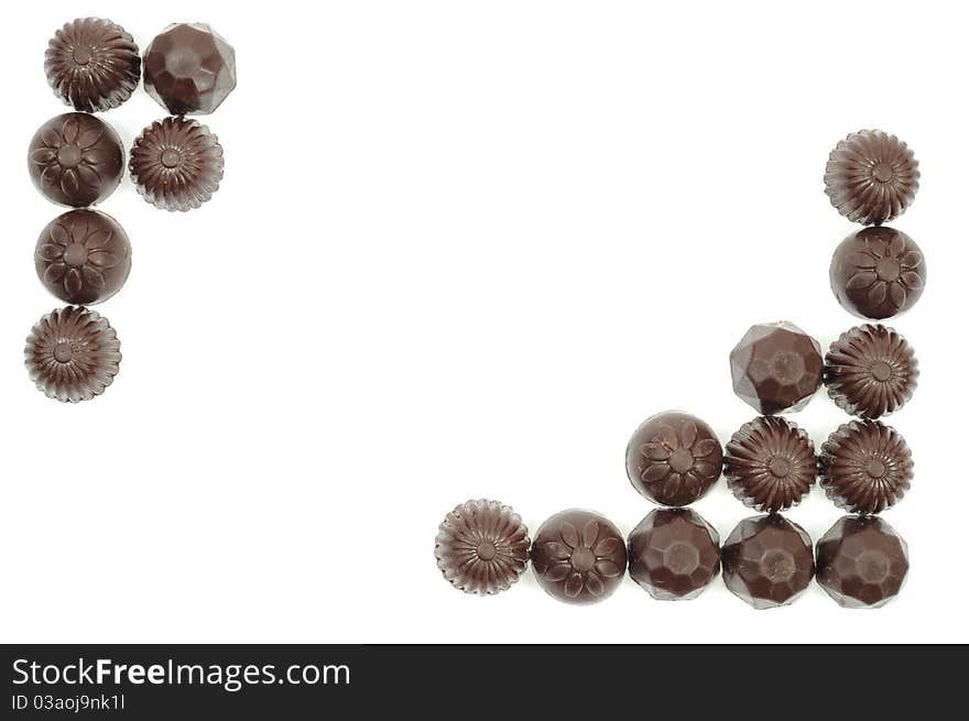 Frame made from chocolat on a white background. Frame made from chocolat on a white background