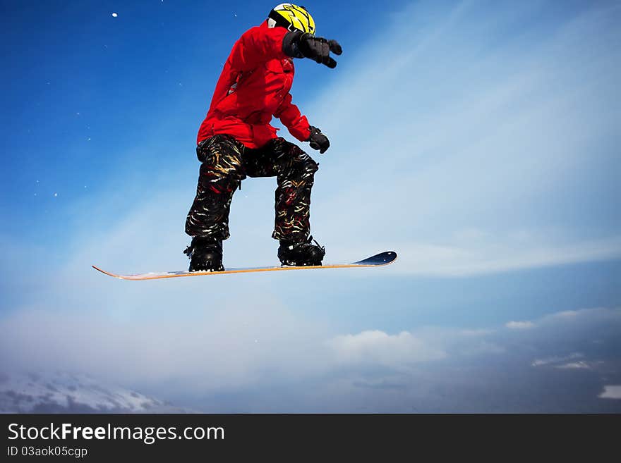 Snowboarder jumping