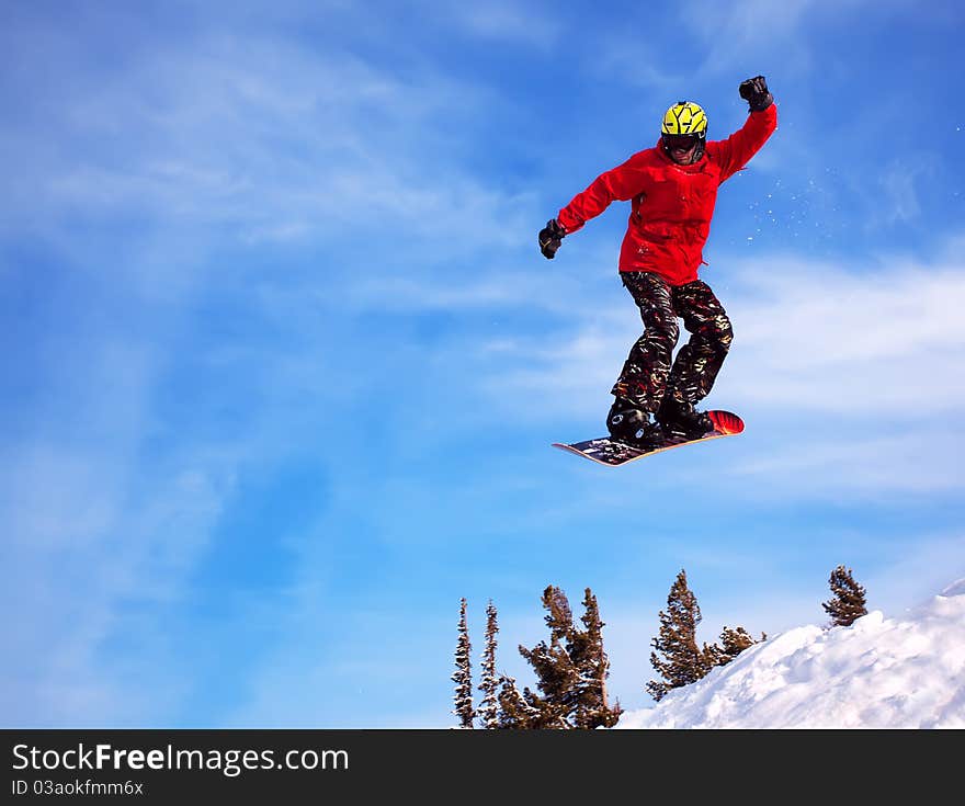 Snowboarder jumping