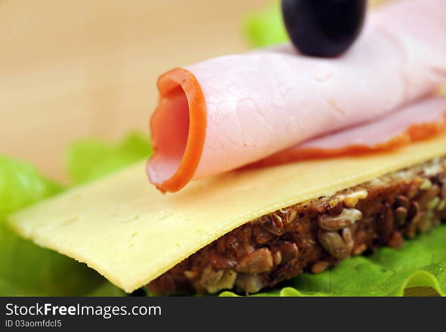 Sandwich with ham and cheese. close up