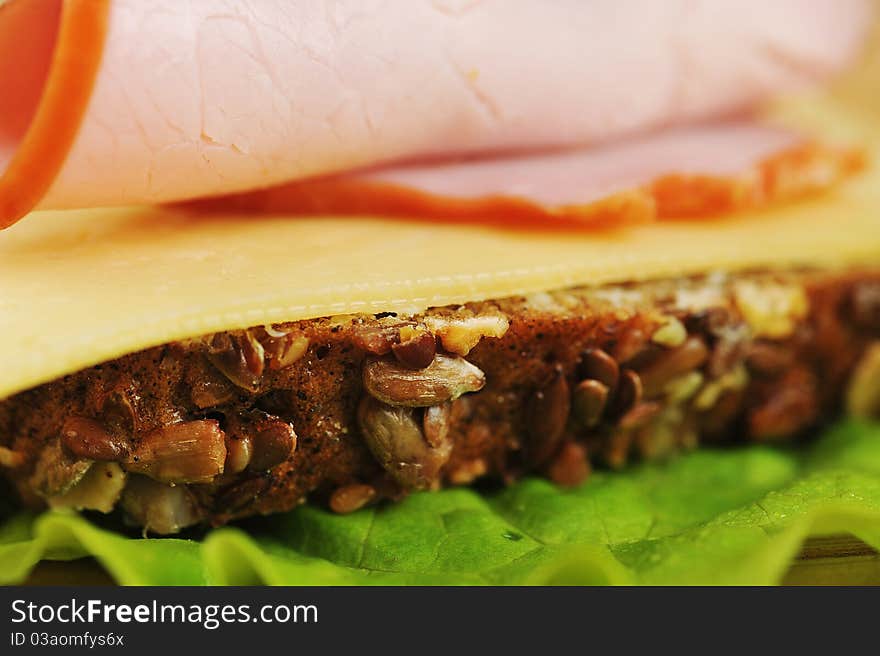 Sandwich with ham and cheese. close up