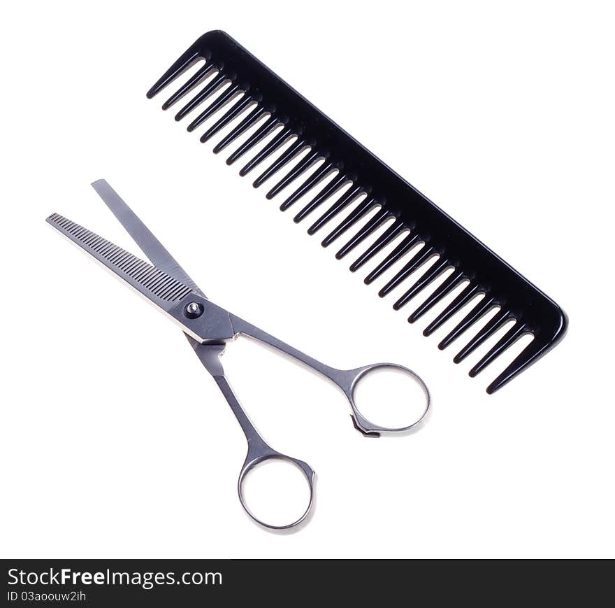 Hairdressing scissors and comb