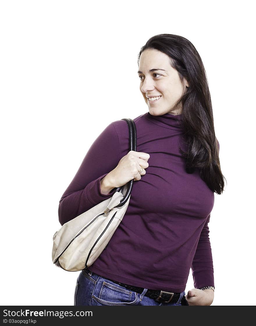 Beautiful young woman with a leather bag on white background