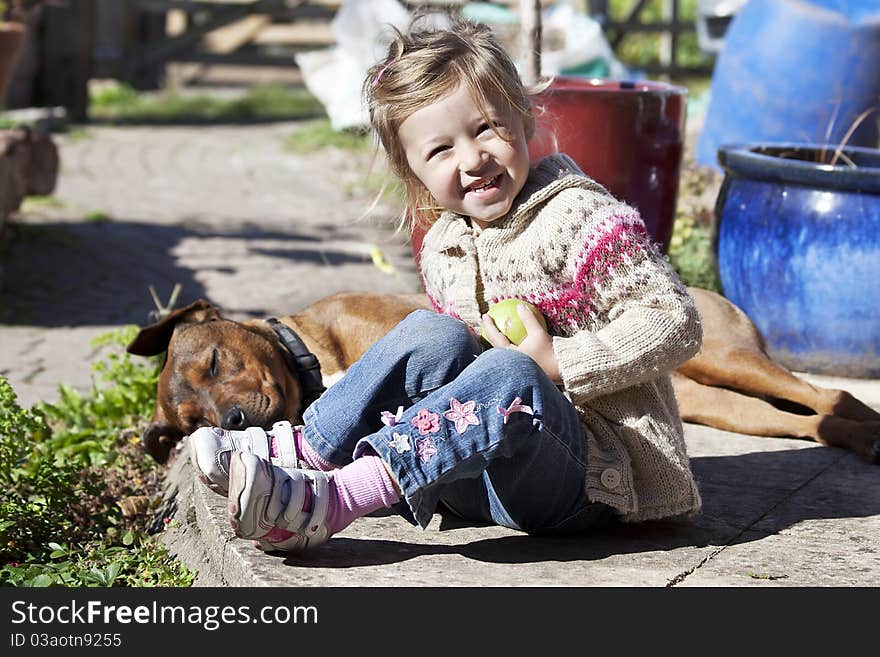 Little girl with her best friend - dog. Little girl with her best friend - dog