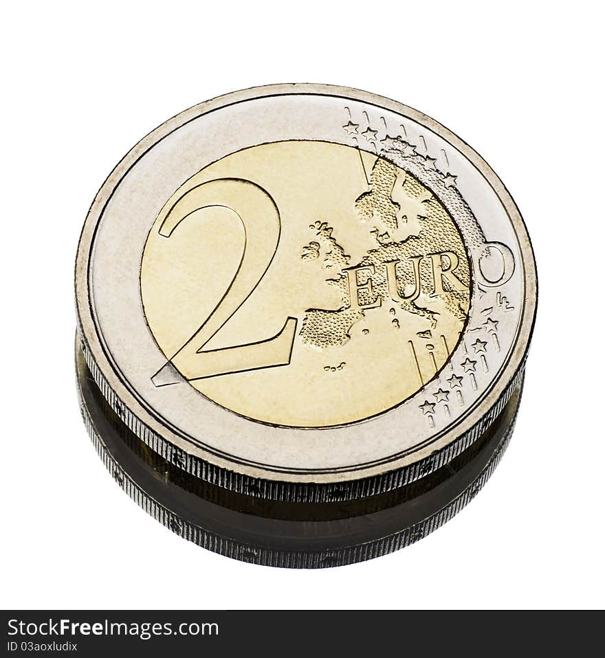 Two euro coin worn on white