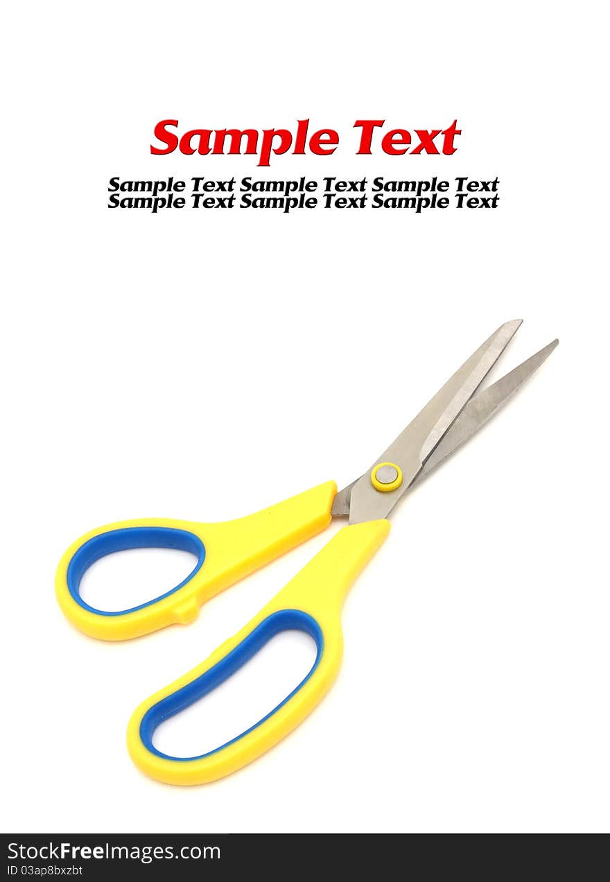 Yellow scissors isolated