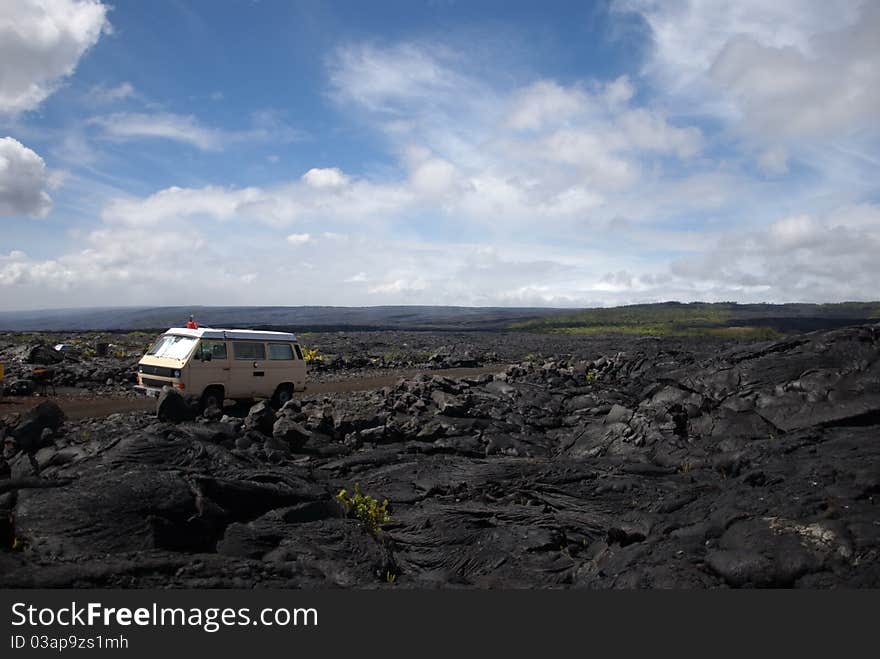 Old van in the middle of lava field