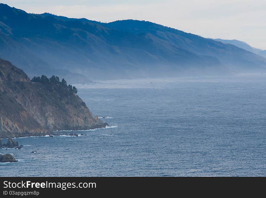 Peaceful gulf with mountains in the mist. Peaceful gulf with mountains in the mist