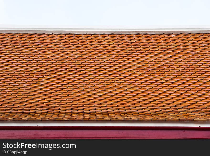 Thai temple roof with brown tiles