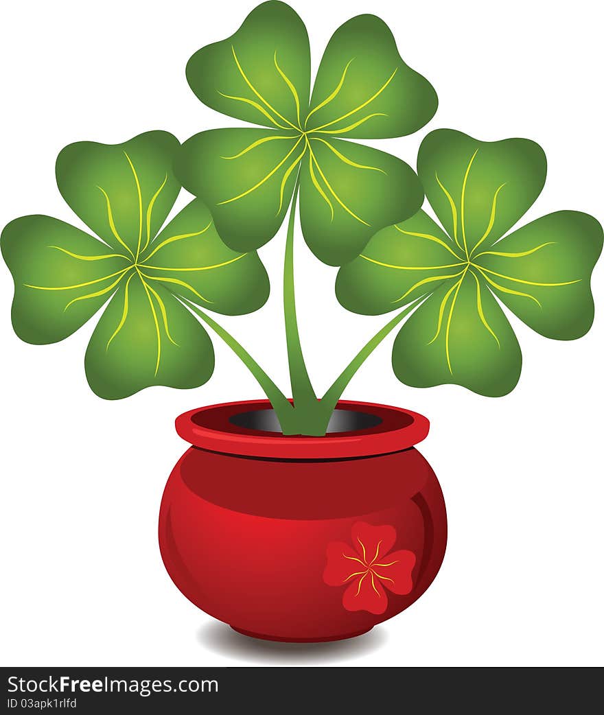 Brightly red pot with a clover. Brightly red pot with a clover