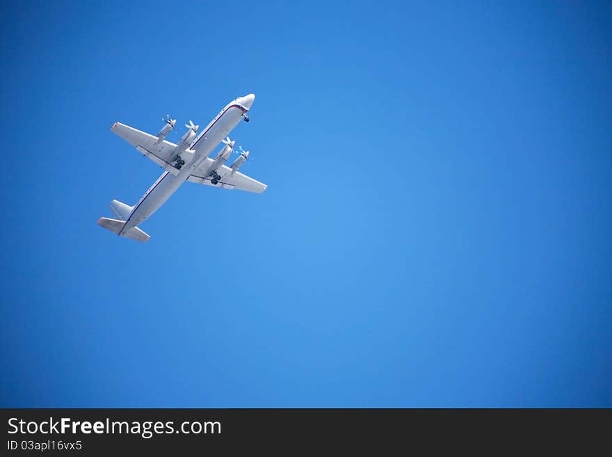 Big passenger airplane flying against blue sky background. Big passenger airplane flying against blue sky background