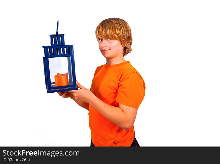 Cute boy holding a hand lantern