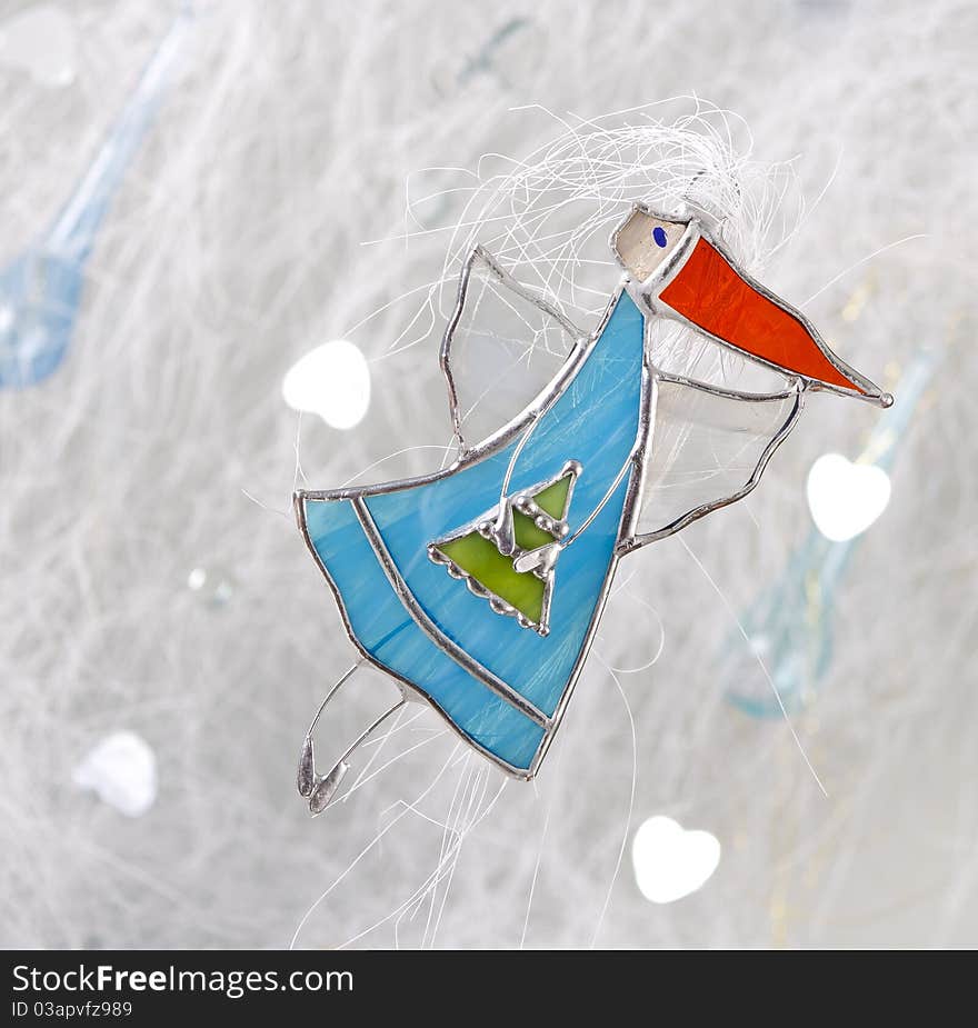 Glass and metal fairy flying on white background. Glass and metal fairy flying on white background