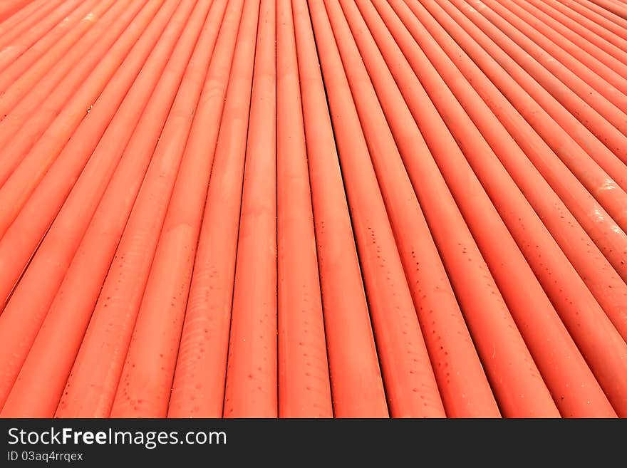 Stack Of Metallic Pipes In A Construction Site