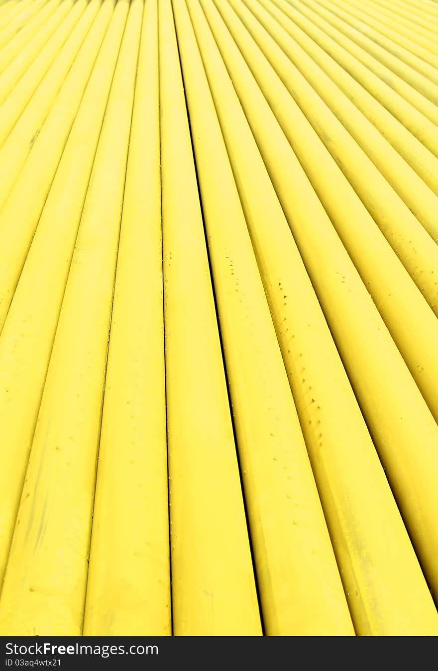 Stack of metallic pipes in a construction site