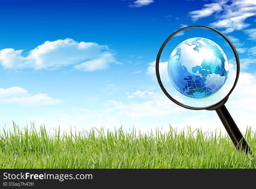 Magnifying glass on the grass