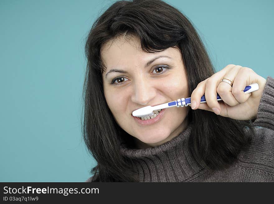 Woman Brushing Teeth