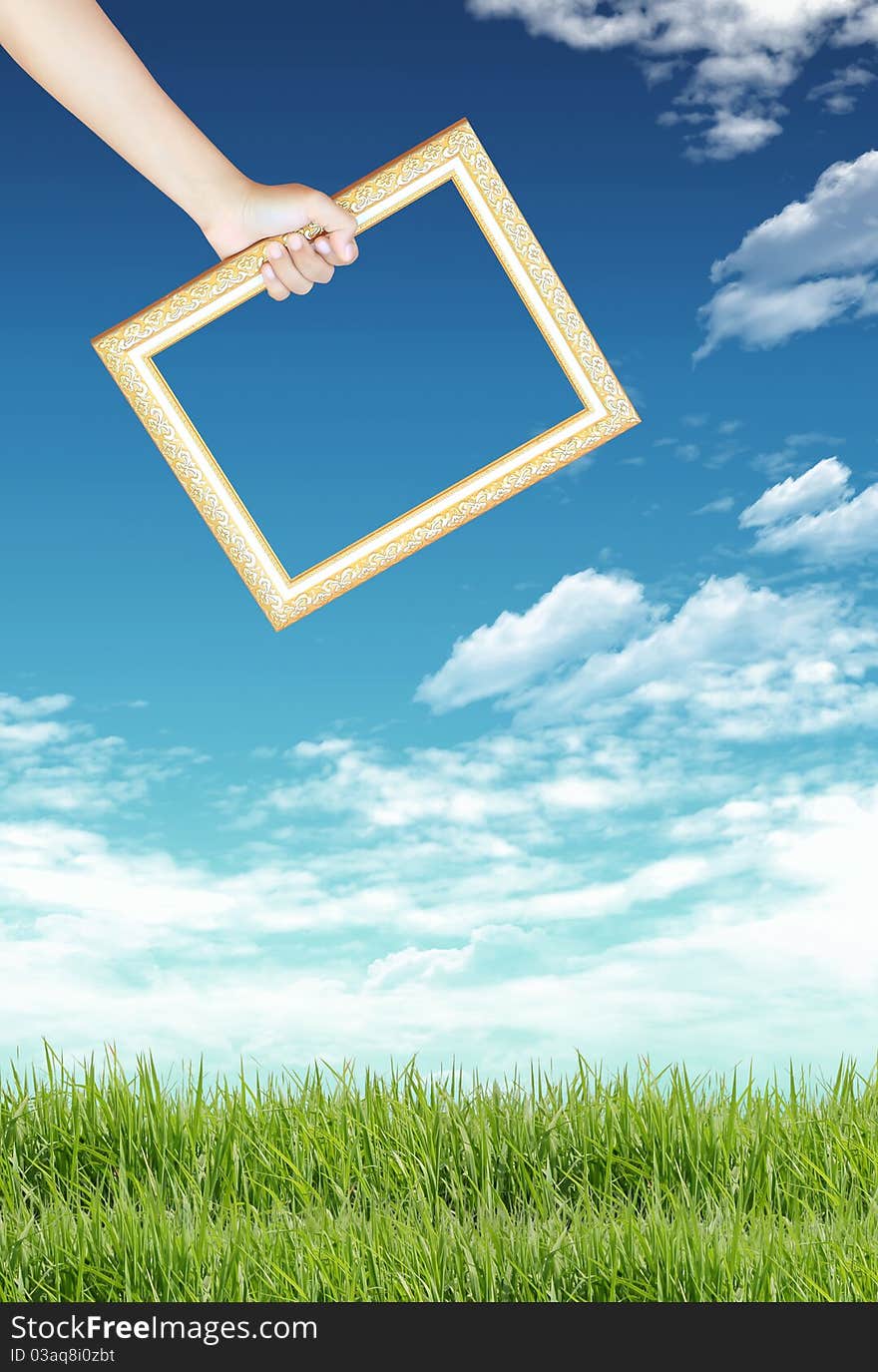 Green grass, blue sky and frame