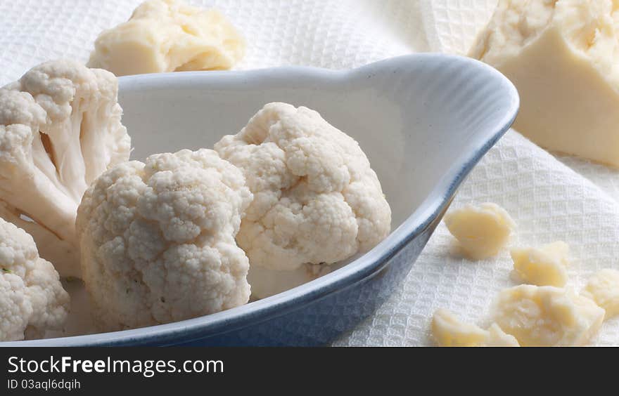 A dish of cauliflower cheese prior cooking. A dish of cauliflower cheese prior cooking