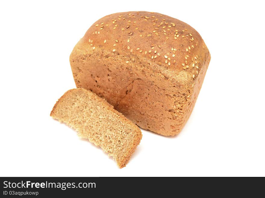 Photo of a roll of black bread on a white background. Photo of a roll of black bread on a white background.