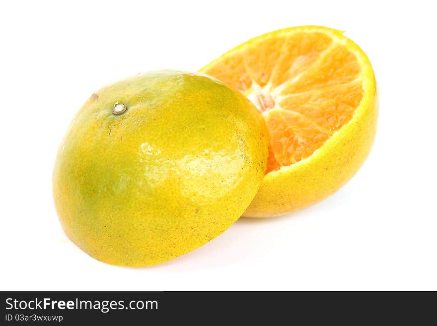 Cut orange on white background