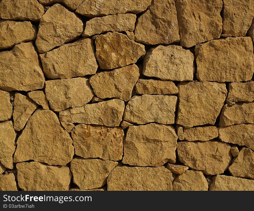 Brown texture background of stone wall