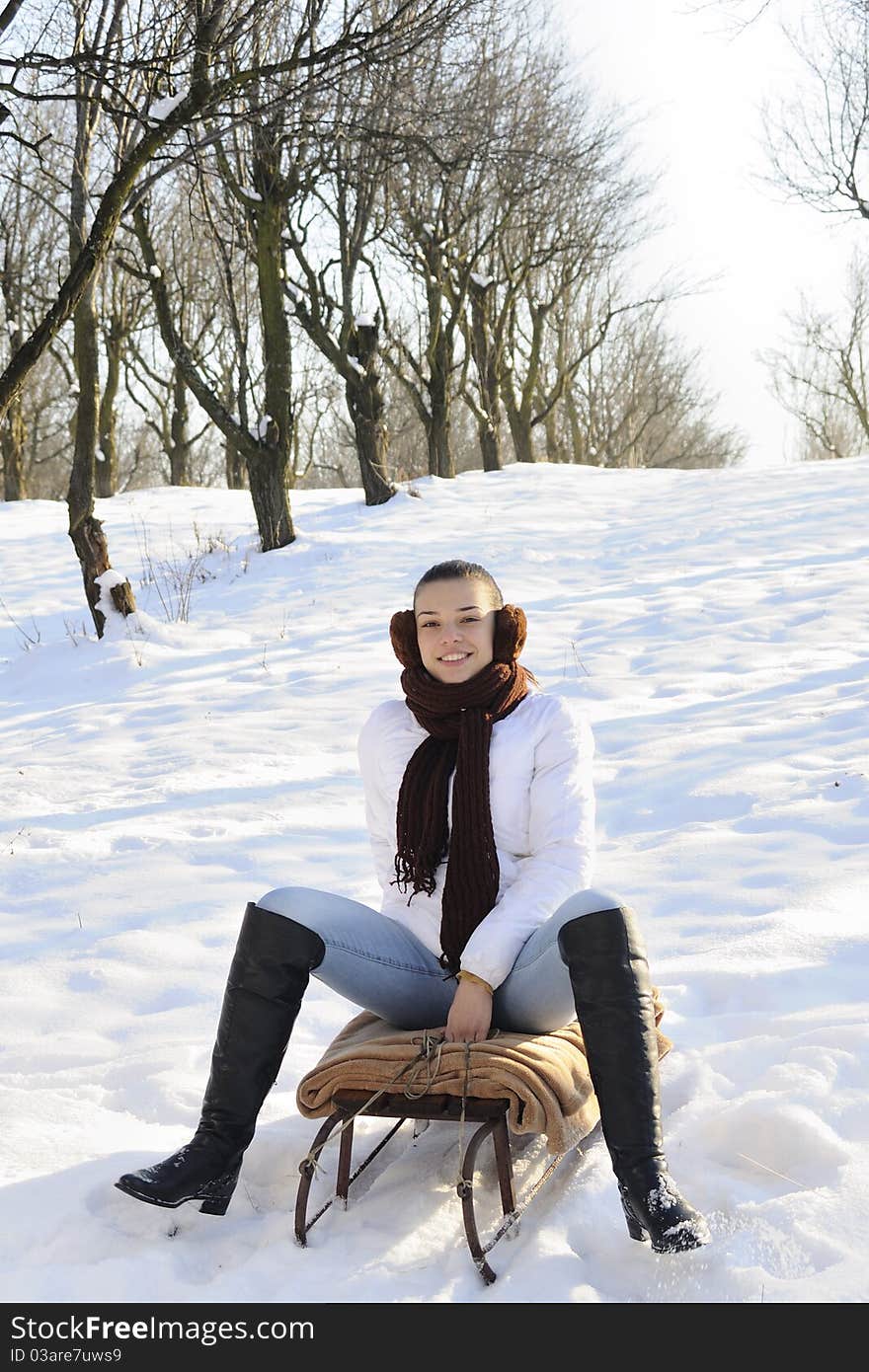 Beautiful brunette resting in winter. Beautiful brunette resting in winter