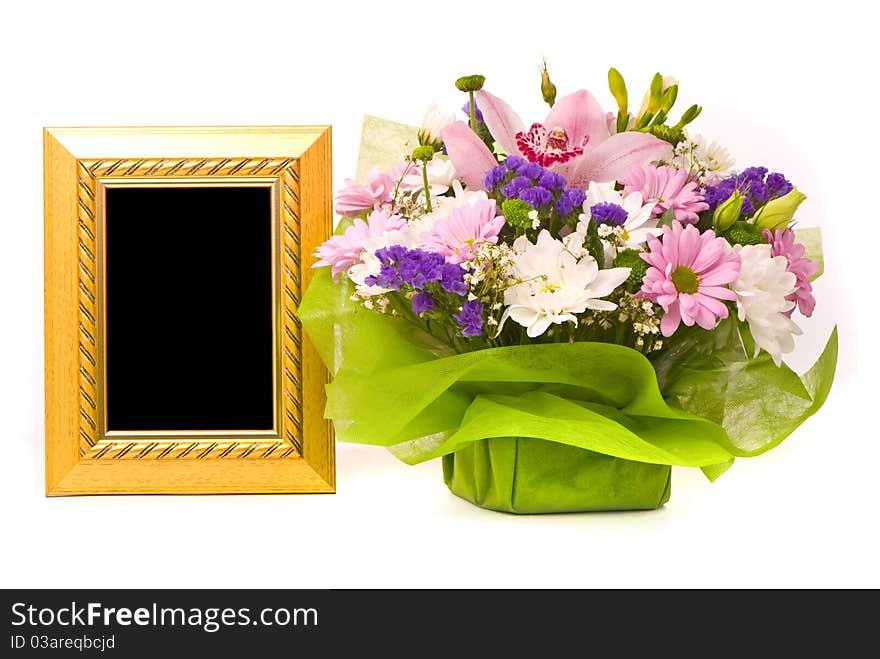 Beautiful bouquet and golden frame on a white