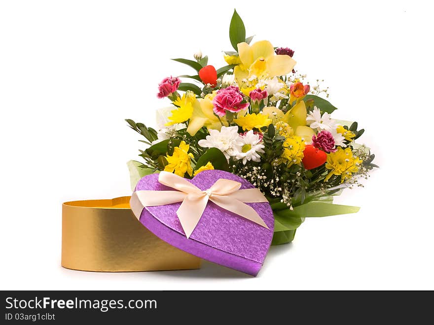 Magnificent bouquet and present box on a white