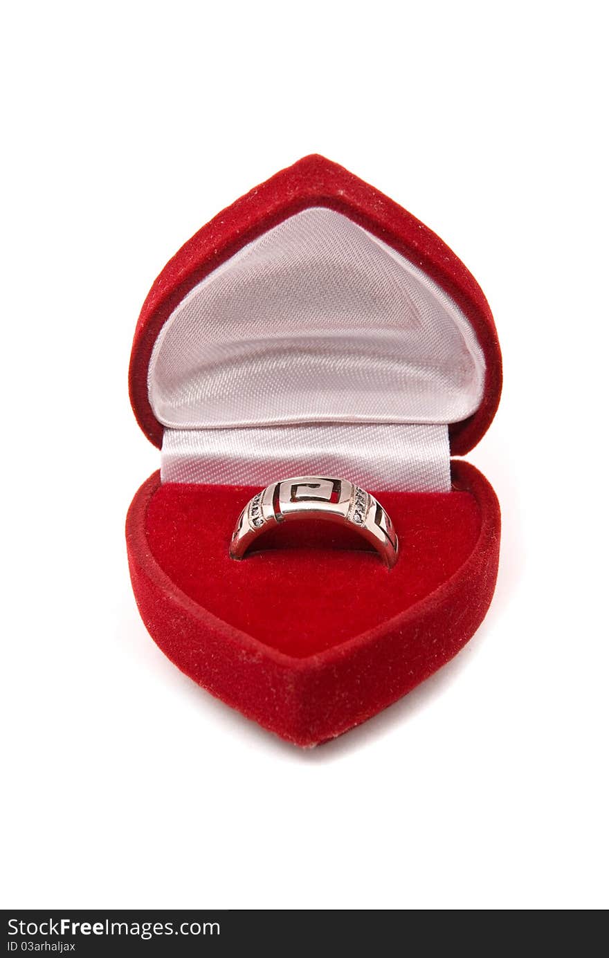 Classic silver ring in red box isolated on a white