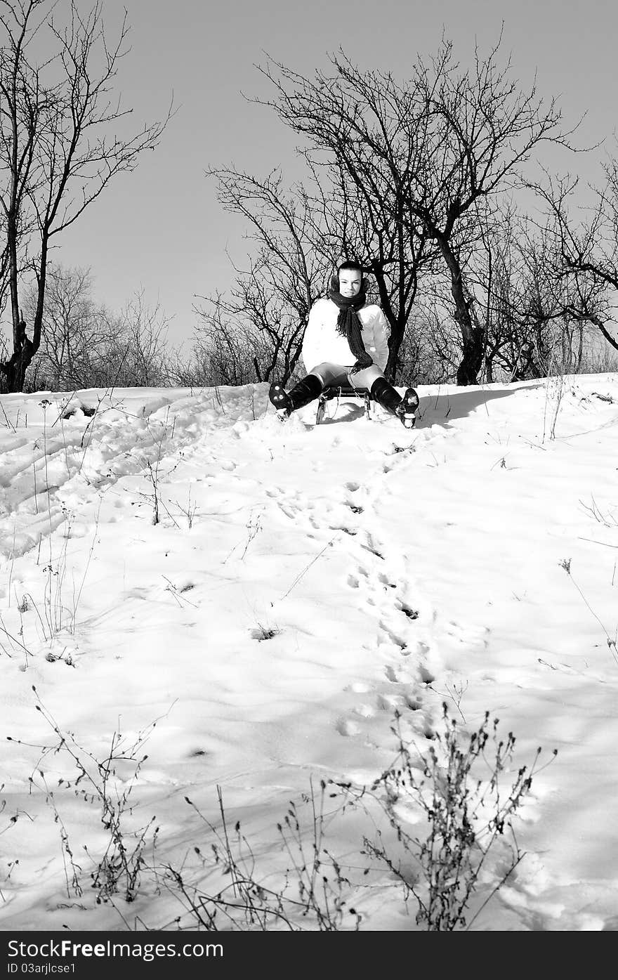 Cheerful female relaxing in winter