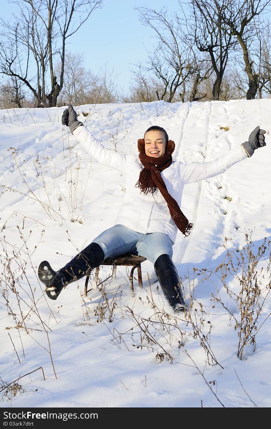 Joyful female relaxing in winter