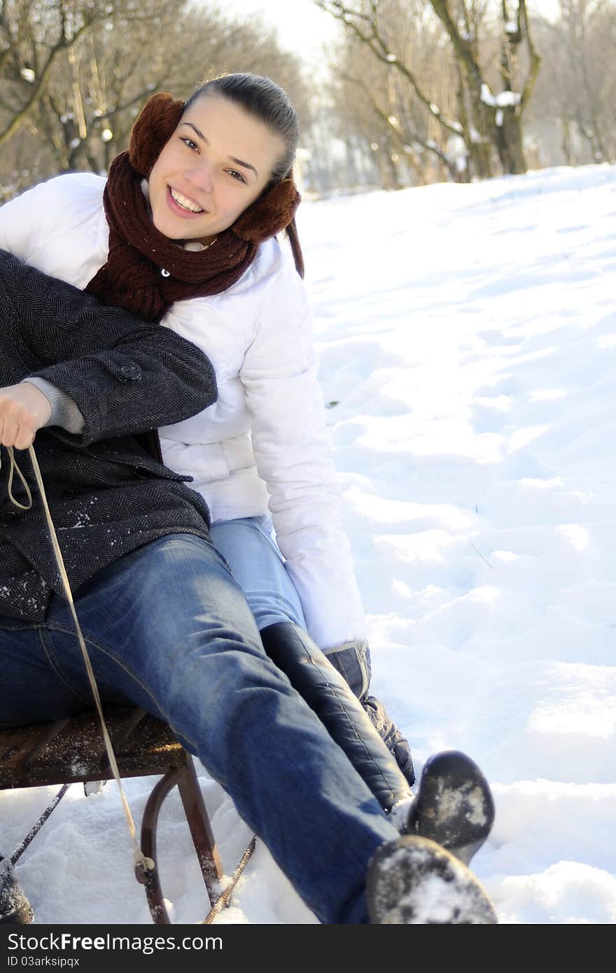 Young joyful woman smiling in winter season. Young joyful woman smiling in winter season