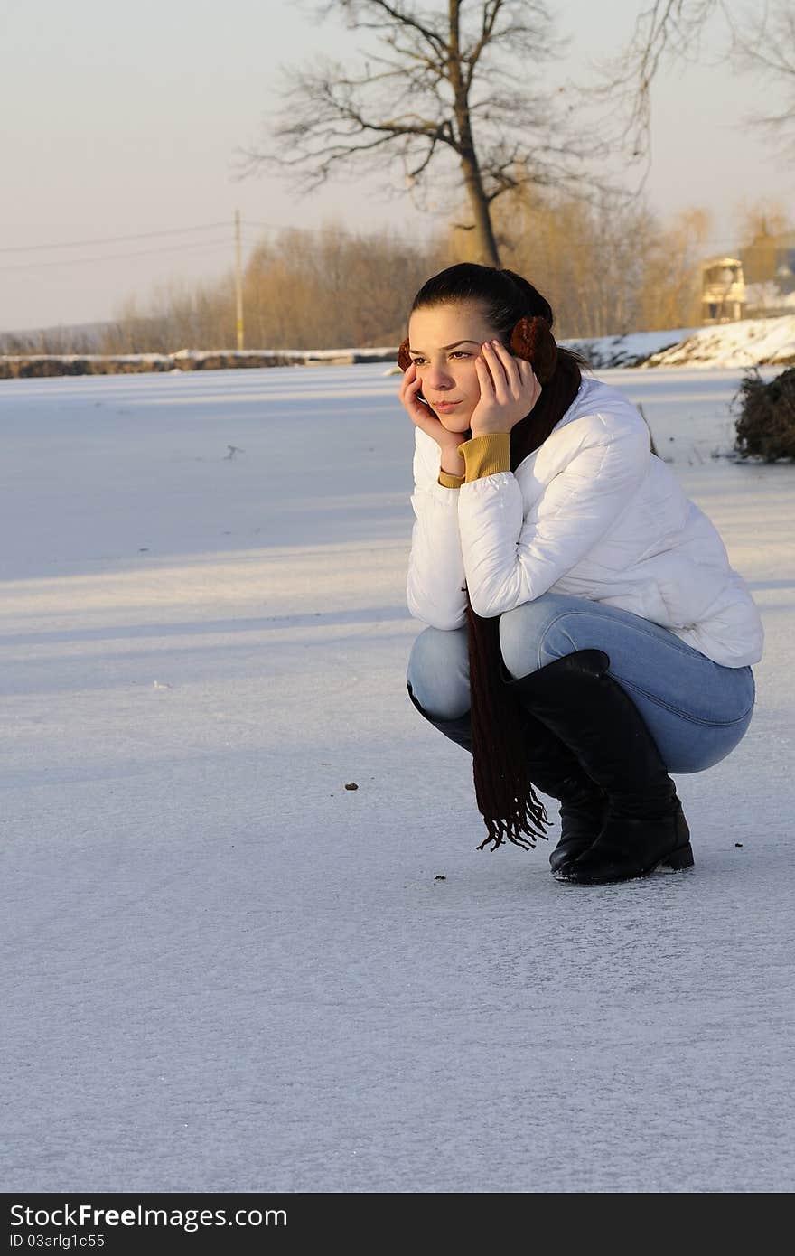 Beautiful brunette resting in winter. Beautiful brunette resting in winter