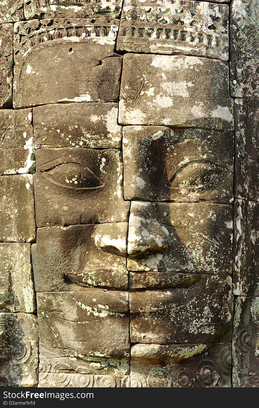 Stone head on towers of Bayon temple in Angkor Thom, Cambodia